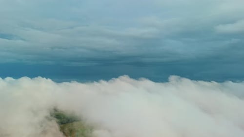 Aerial Wide View of the Foggy and Fluffy Clouds Sky and Clouds From Drone View