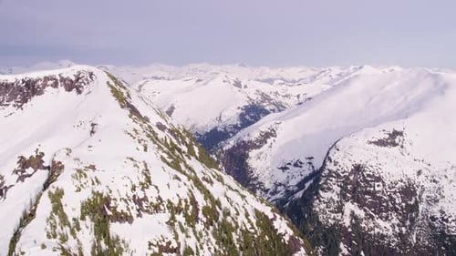 British Columbia, Canada Circa-2018. Aerial View of Snow Covered Mountain Range