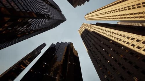 Looking Up Manhattan Skyscrappers With Skies