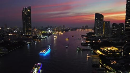 Skyscrapers in Bangkok City and River at Night
