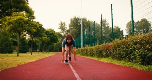 Young Sporty Woman Runner is Training in Morning in Public Park Fitness Girl is Jogging Outdoor