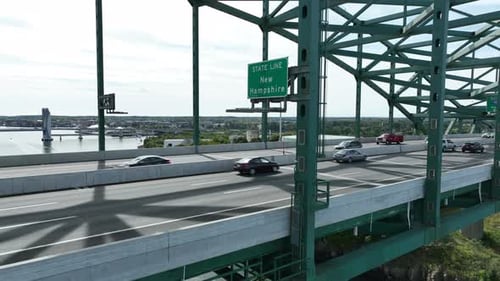 State Line between Maine and New Hampshire. Welcome over Piscataqua River. Rising aerial.