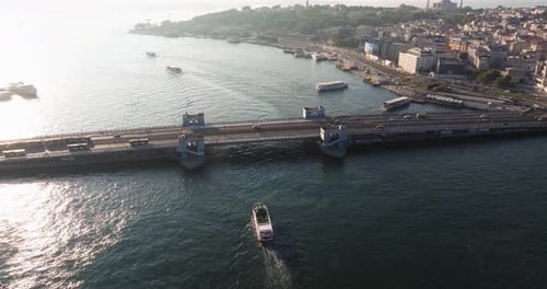 Cinematic Establishing Drone Shot Above Galata Bridge, Golden Horn. Istanbul, Turkey