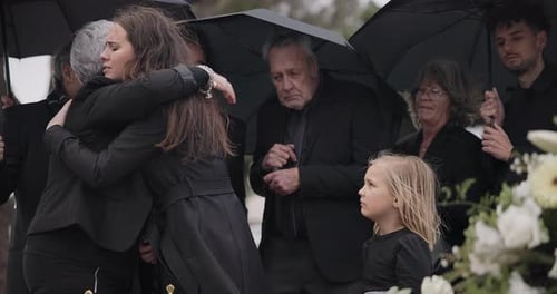 Funeral, crying family and people hug for grief support, mourning depression