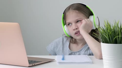Homeschooling Kid Girl Feeling Bore to Do Homework