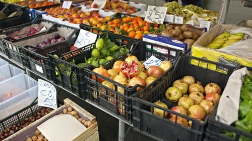Delicious colorful fruits on display in local market, close up motion shot