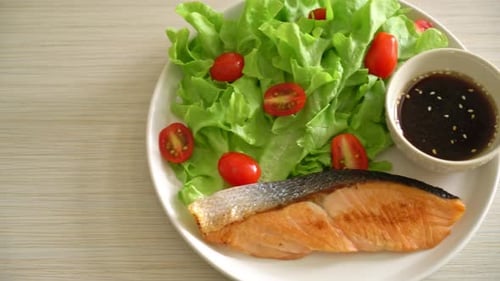 grilled salmon fillet steak with vegetable salad - healthy food style