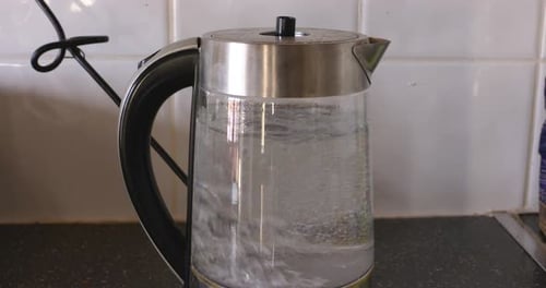 Water Boiling Vigorously Inside Electric Kettle