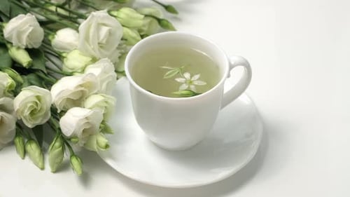 Cup of Floral Tea with Flowers