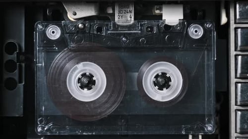 Vintage Cassette Tape Spinning Inside Player