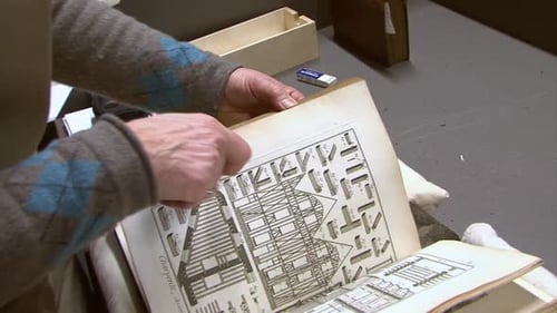 Cleaning Pages of an Antique Book