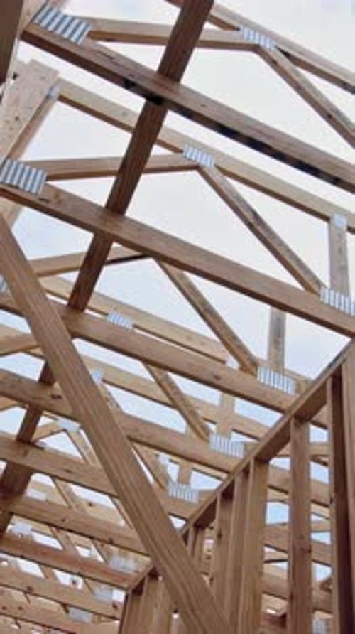 Construction of Wooden Structure Under Clear Sky in New Residential Area During Works Day