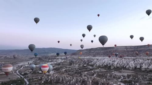 Hot Air Balloons Flying at Sunrise in Cappadocia, Turkey