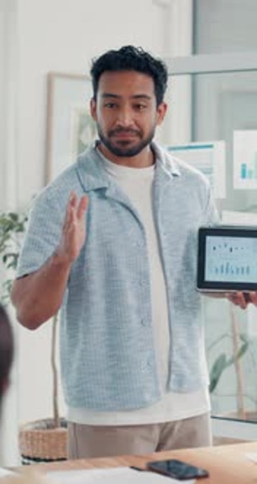 Businessman, tablet screen and data in meeting for presentation, campaign performance or trends