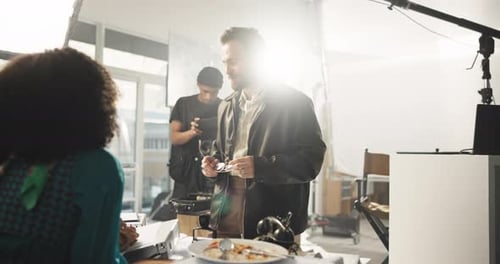 Adults Working Together in Studio Workplace