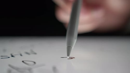 Stylus Drawing on a Tablet Close Up