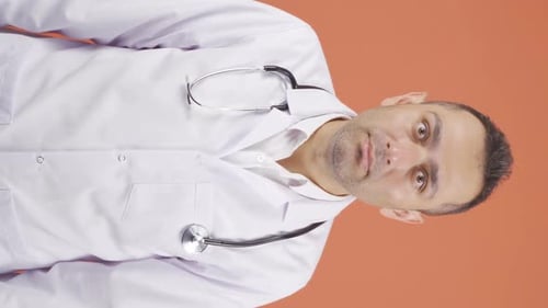 Doctor Shows Surprised Expression in a Vertical Video