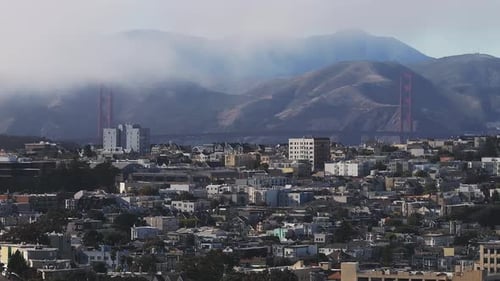 Aerial View of the Golden Gate Bridge Surrounded By Fog in San Francisco California USA