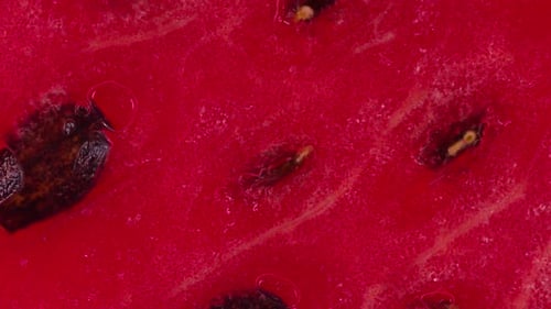 Pressure On Watermelon Slice With Seeds