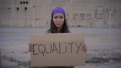 Feminist Woman Holding a Placard Saying Equality Demonstration Banners