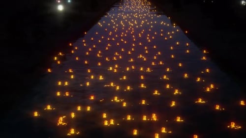 Numerous Glowing Lanterns Floating on River at Night