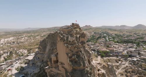 Hikers Take in Panoramic View of Uchisar Castle, Cappadocia, Turkiye