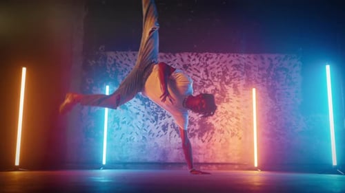 African American Bboy Performing Trick on Floor in Dance Studio Slow Motion Breakdance and Hiphop