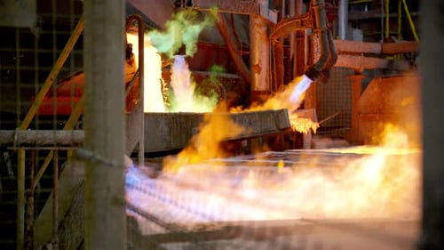 Abstract Orange Flames in Industrial Manufacturing Setting