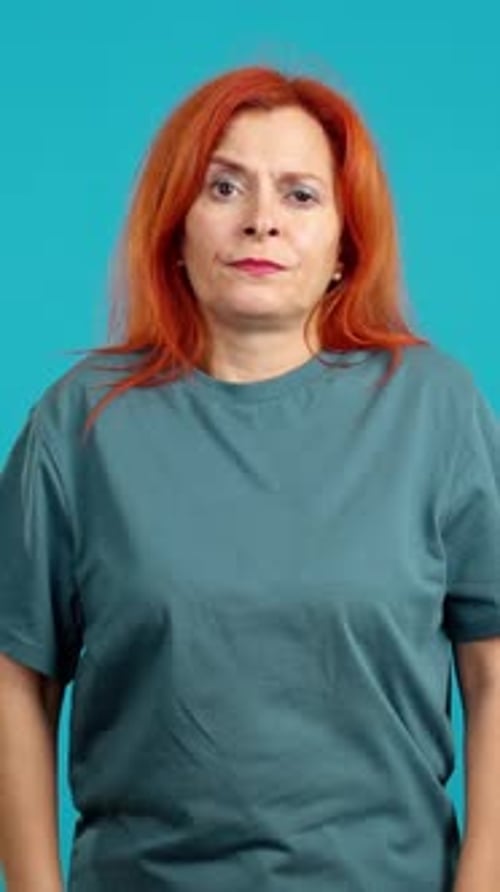 Red Haired Woman Looking Sad