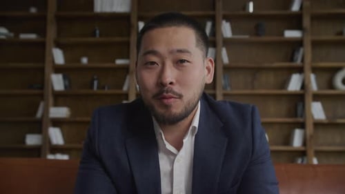POV Man in Suit Talking on Video Call in Office
