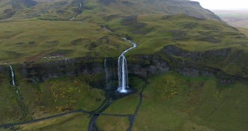 Seljalandsfoss A Cinematic Journey Through Iceland's Breathtaking Green Waterfall Landscape