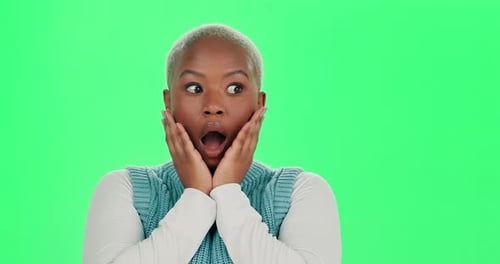 Face, surprise and wow with black woman on green screen in studio for reaction to gossip or news