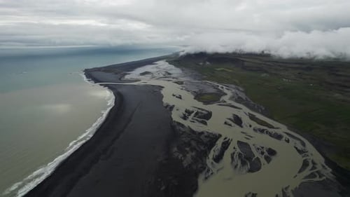 Aerial view of endless coastline near the river estuary, Iceland.
