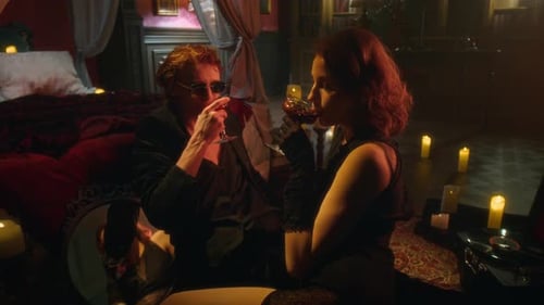 Vampire Man and Woman Sharing Red Blood by Candlelight in Luxurious Gothic Room