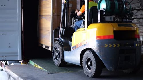Warehouse worker working. Warehouse import export product. Warehouse store shelves