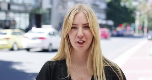 4k video footage of a young woman being interviewed on the street