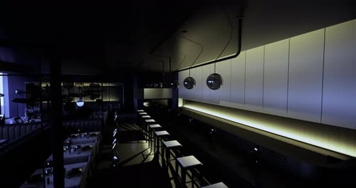 Modern Restaurant Interior with Unique Lighting During Evening Hours