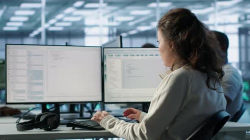 IT Specialist in Server Farm Ensuring Valuable Data Remains Shielded