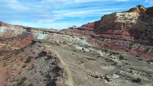 Beautiful aerial footage of canyons full of red rocks in utah