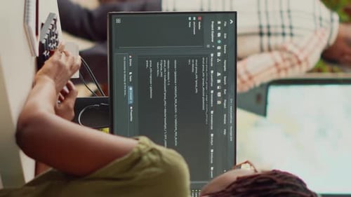 Typing Code at Computer Workstation