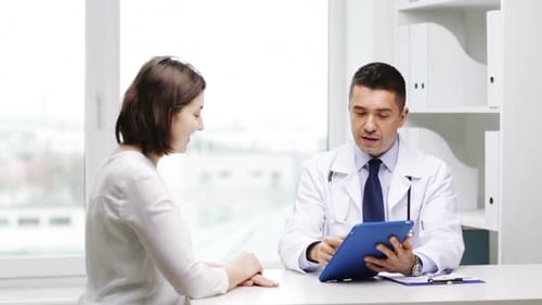 Doctor Explaining Test Results to Patient in Office