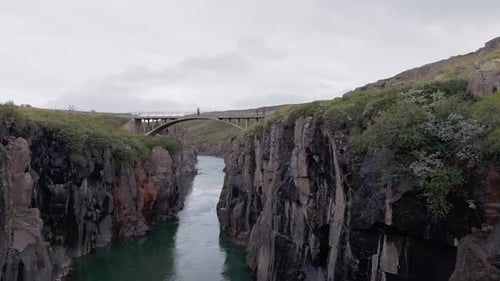 Stunning Aerial View Of An Icelandic Canyon And Mountain River