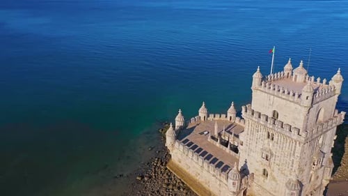 Drone Tilt and Track Belem Tower Lisbon Portugal on Sunny Day