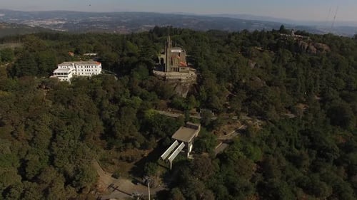 Church in the Mountain Surrounded by Green Forest Trees