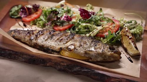 Grilled Fish with Green Salad and Lemon