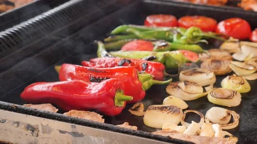 Long Red Pepper Being Barbecued at a Grill
