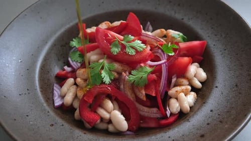 Colorful Bean Salad with Tomatoes and Red Onion