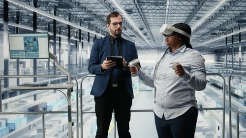 Managers in Microchip Smart Factory Using VR Glasses Gear to Develop Electronics