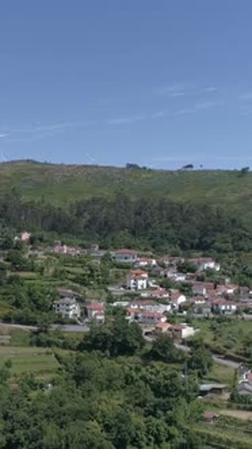 Vertical Video Above Mountain Houses