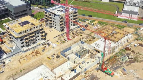 Lots of tower Construction site with cranes and building. Residential construction. Aerial View